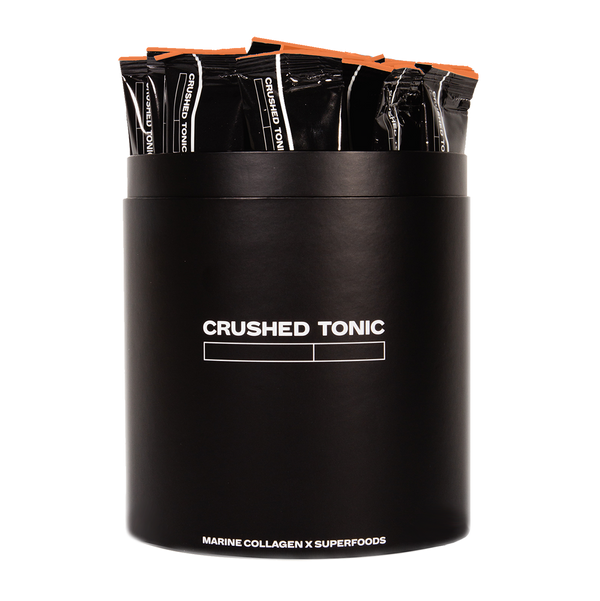 An image of Crushed Tonic's Turmeric Crush with 30 Drink Sticks in a Black Canister