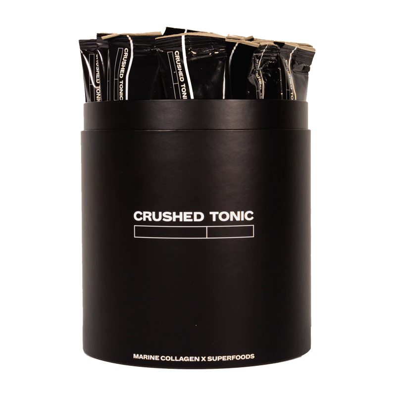 An image of Crushed Tonic's Lucuma Dalkom Crush with 30 Drink Sticks in a Black Canister